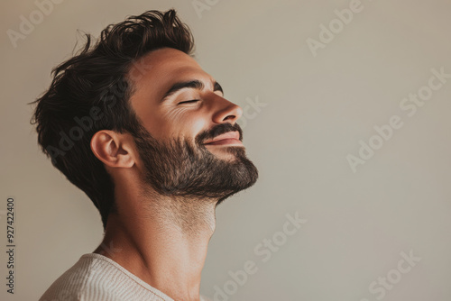 A close up of a man's face with her eyes closed