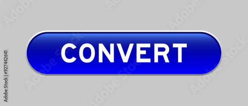 Blue color capsule shape button with word convert on gray background