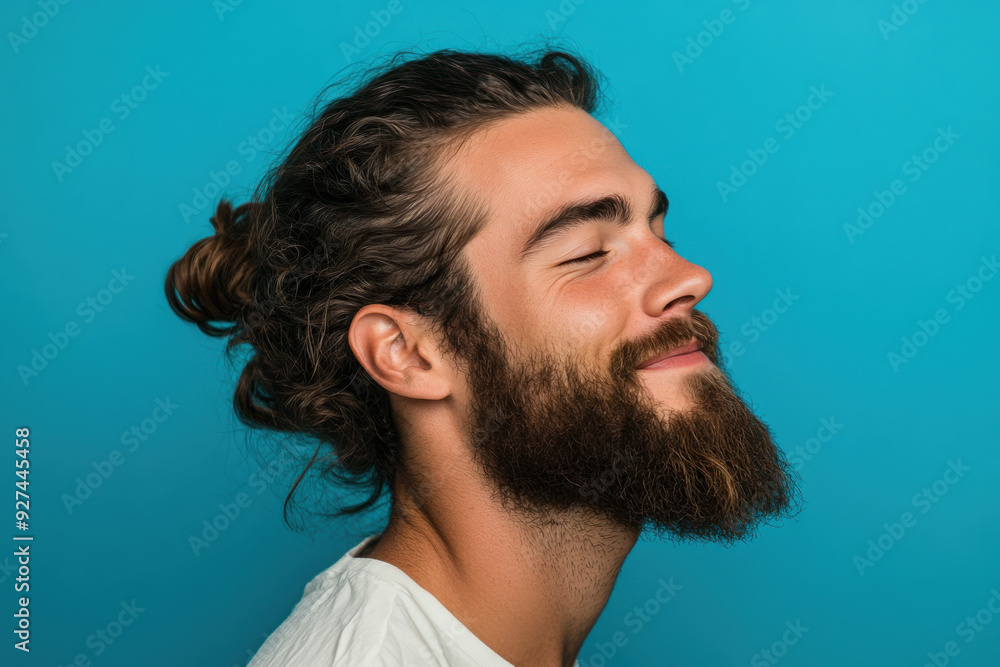 Fototapeta premium A close up of a man's face with her eyes closed