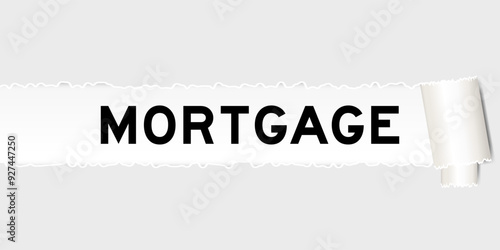 Ripped gray paper background that have word mortgage under torn part