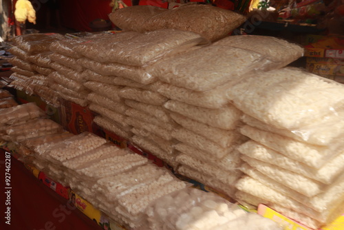 Small Packets of puffed rice prashad selling  in the mandir or temple photo