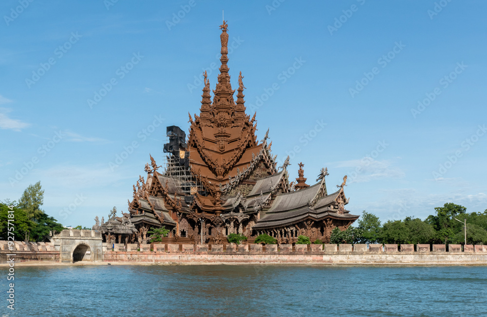 Sanctuary of Truth Museum located in Pattaya Thailand, is the largest wooden castle in the world The museum structure is a hybrid of temple and a castle that is themed on the Ayutthaya Kingdom