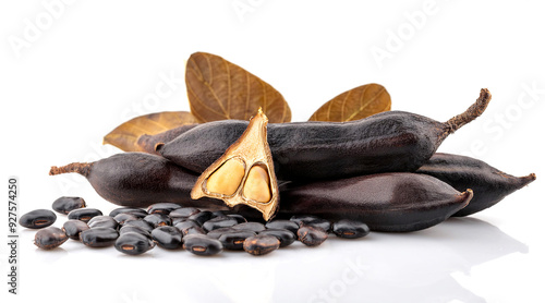 A bunch of Dark Mucuna pruriens whole and seeds on white background.