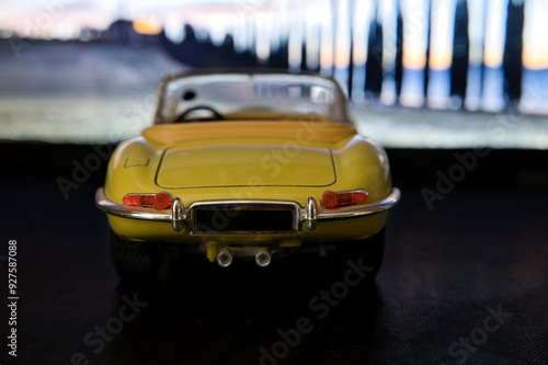 yellow vintage car on the street