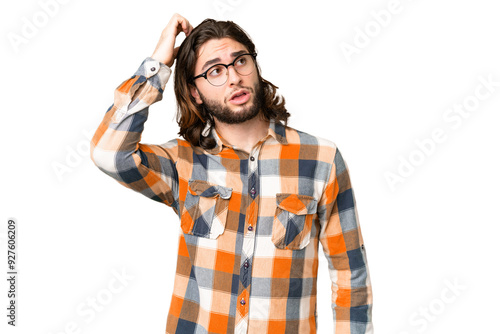 Young handsome man over isolated chroma key background having doubts while scratching head