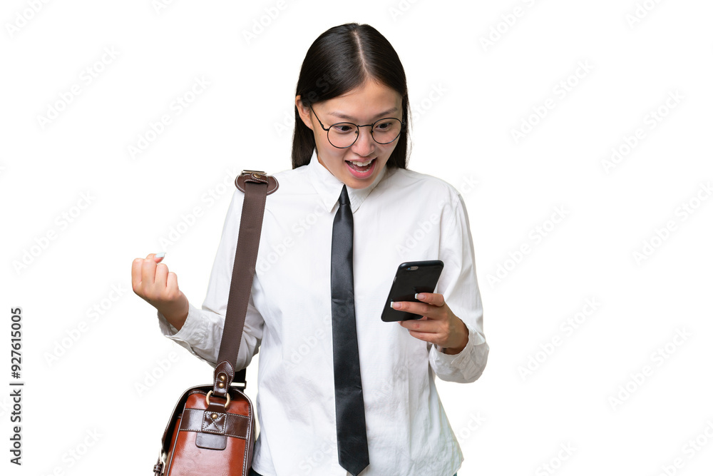 Young Asian business woman over isolated background surprised and sending a message Young Asian business woman over isolated background surprised and sending a message
