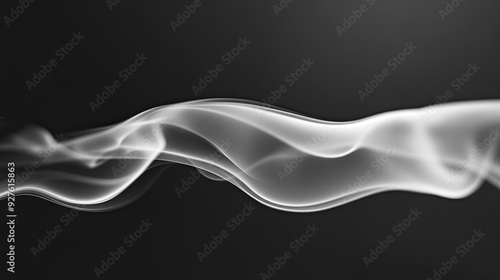 A mesmerizing black and white photo of a long, curving line of smoke, creating an abstract and fluid form. A mesmerizing black and white photo of a long, curving line of smoke, creating an abstract and fluid form.