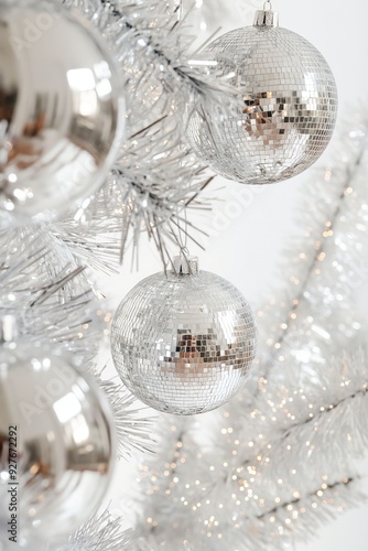 Silver tinsel and disco ball Christmas ornament isolated on white background