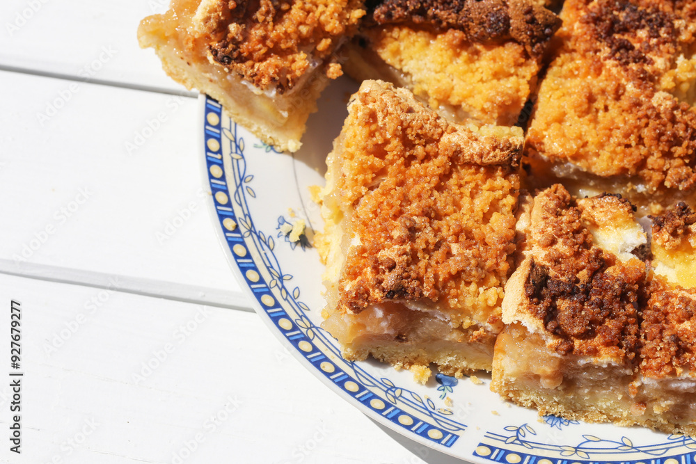 Homemade apple pie on a white wooden table. Pie served on a plate. Delicious rustic dessert background. Empty copy space food background. Homemade apple pie on a white wooden table. Pie served on a plate. Delicious rustic dessert background. Empty copy space food background.