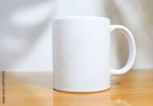 white cup on a wooden table