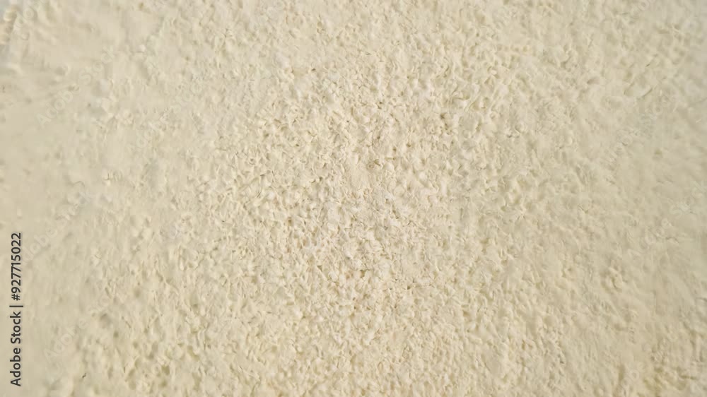 Smooth sand surface with a beige tone Smooth sand surface with a beige tone