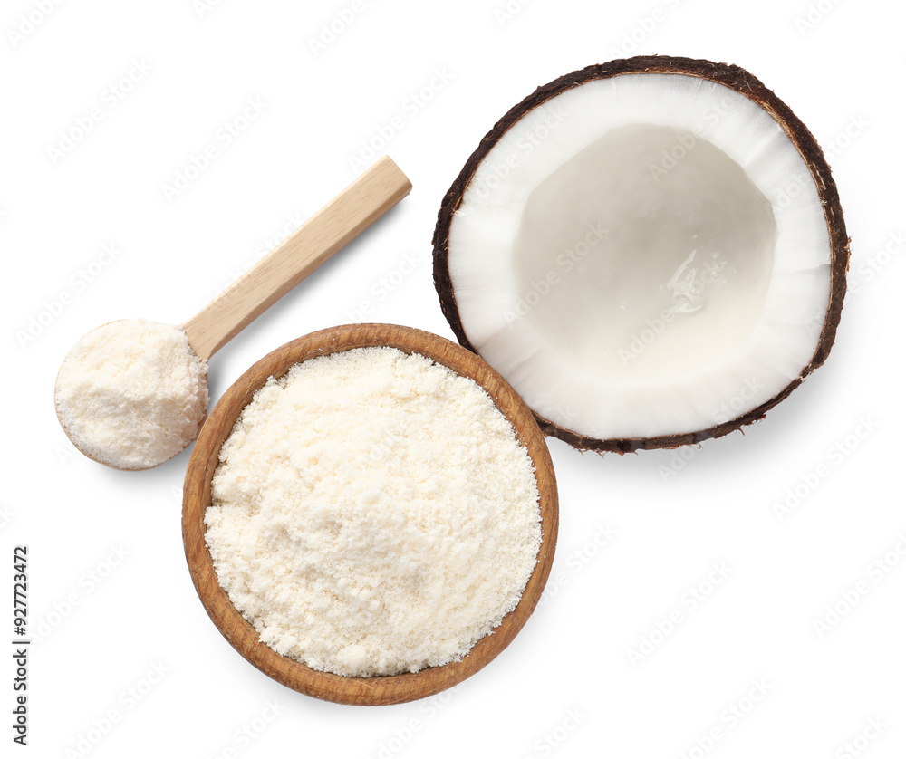 Fresh coconut flour in bowl, spoon and nut isolated on white, top view Fresh coconut flour in bowl, spoon and nut isolated on white, top view