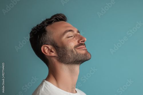 A close up of a man's face with her eyes closed