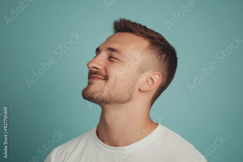 A close up of a man's face with her eyes closed