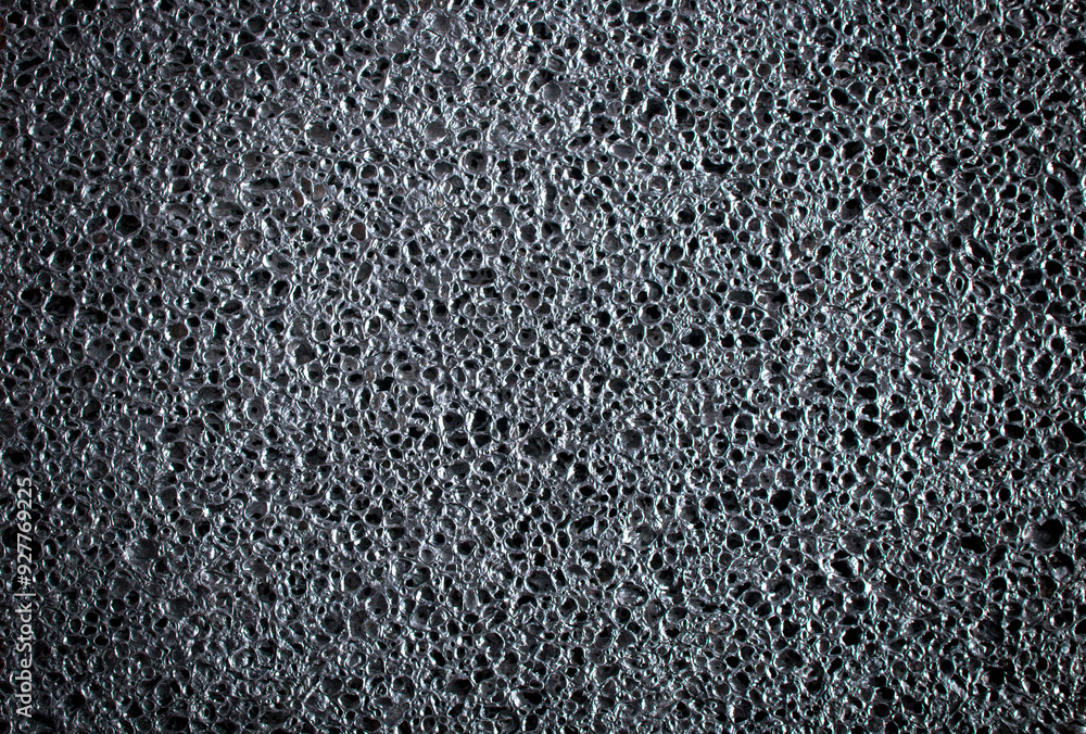 silver. foamed metal texture, sponge in the form of texture or background with vignetting, place for text, location of the object silver. foamed metal texture, sponge in the form of texture or background with vignetting, place for text, location of the object