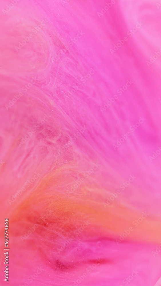 Fototapeta premium Smoky paint. Shiny ink. Defocused pink orange color flowing translucent drop emulsion sparkling particles beauty gel texture abstract art background.