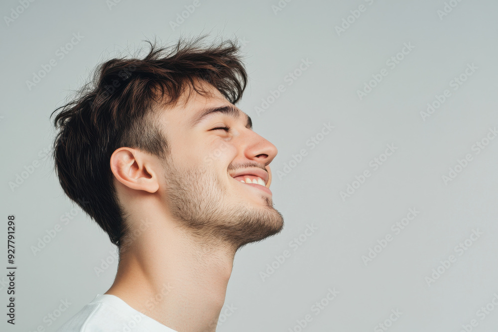 Obraz premium A close up of a man's face with his eyes closed