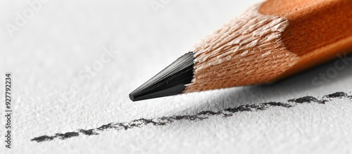 Obraz na płótnie Close Up of a Graphite Pencil Drawing a Line on Paper w salonie