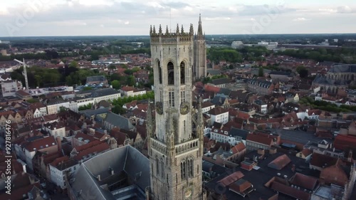 Aerial view of Brugge medieval architecture and iconic Belfry tower at sunset