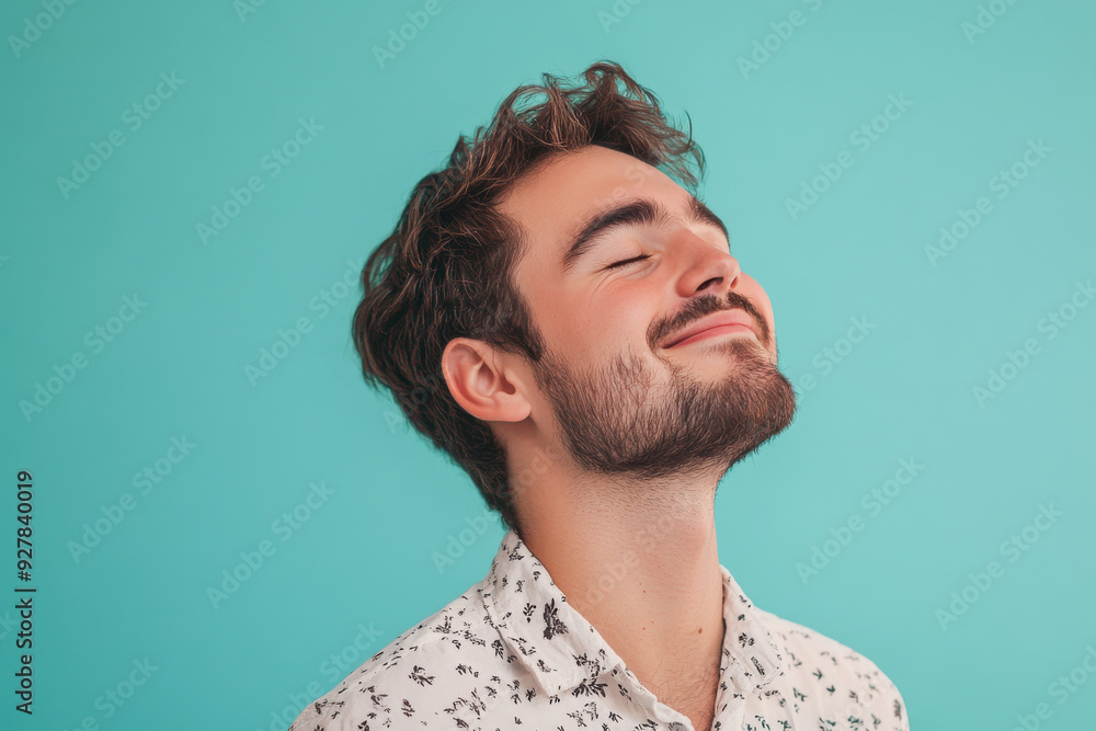 A close up of a man's face with his eyes closed