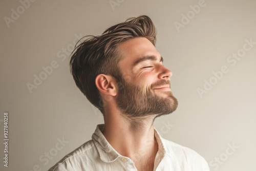 A close up of a man's face with his eyes closed