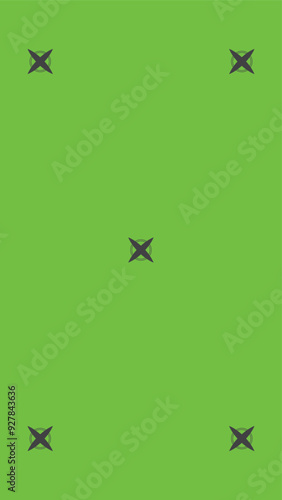 Green screen background, VFX motion tracking markers. Art design green screen backdrop template. Abstract concept video footage replacement tracking markers element.	
