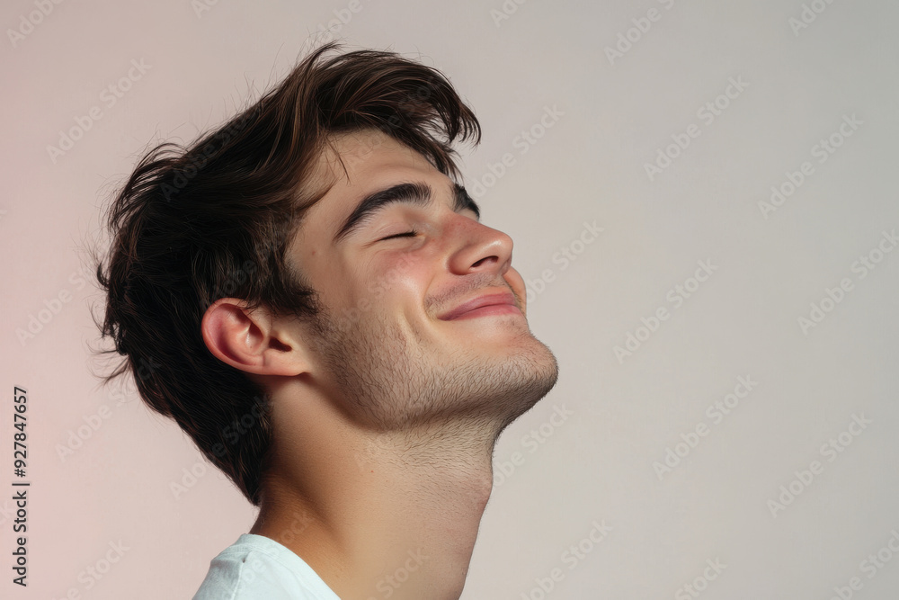 Fototapeta premium A close up of a man's face with his eyes closed