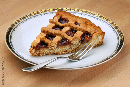 Fotografie Slice of Delight: A Piece of Pie on a Plate with Fork