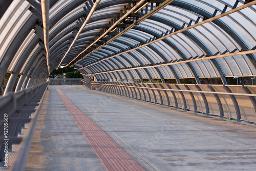 Cuadro en lienzo Industrial Railway Bridge Over Urban Landscape with Steel Structure, Empty Track