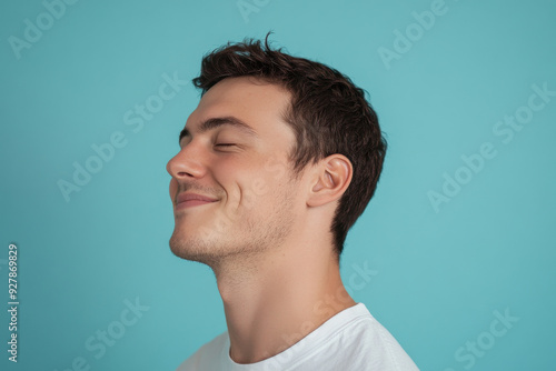 A close up of a man's face with his eyes closed