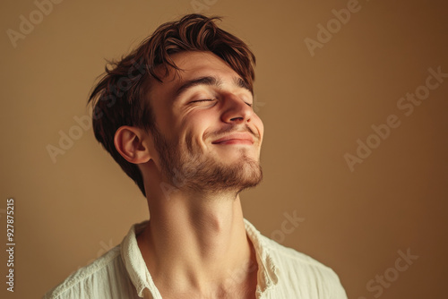 A close up of a man's face with his eyes closed