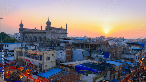 Makkah Masjid built with bricks from Makkah, in Hyderabad old city during sunset. photo