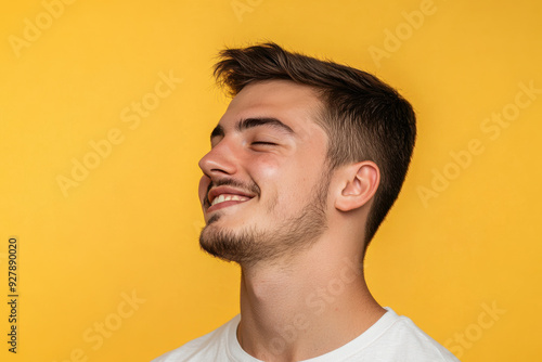 A close up of a man's face with his eyes closed