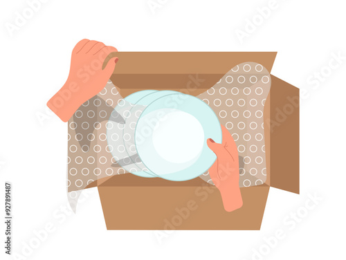 Isolated female hands packing fragile ceramic plates into bubble wrapping film and cardboard box
