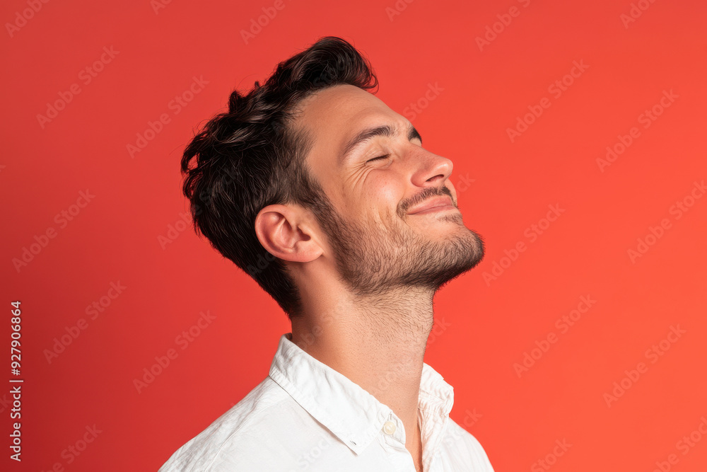 Fototapeta premium A close up of a man's face with his eyes closed