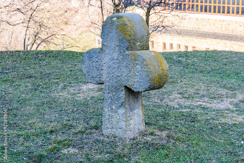 Ancient cross at the yard of Saint Elias Church in village Subotiv. Cossack burial photo