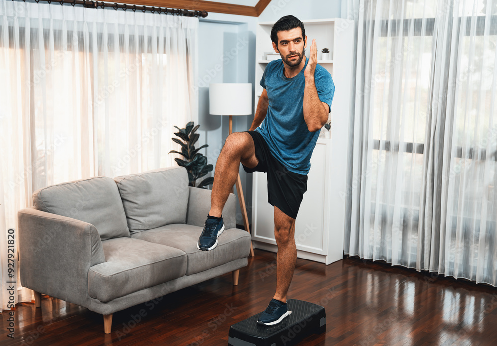 Athletic and sporty man running posture at home body workout exercise session for fit physique and healthy sport lifestyle at home. Gaiety home exercise workout training. Athletic and sporty man running posture at home body workout exercise session for fit physique and healthy sport lifestyle at home. Gaiety home exercise workout training.
