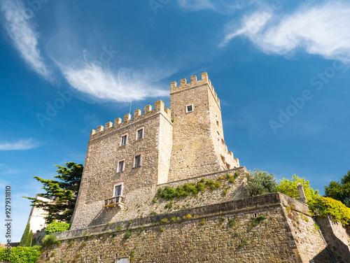 Medieval Manciano Castle: Tuscan Fortress Towering Against Azure Summer Sky photo