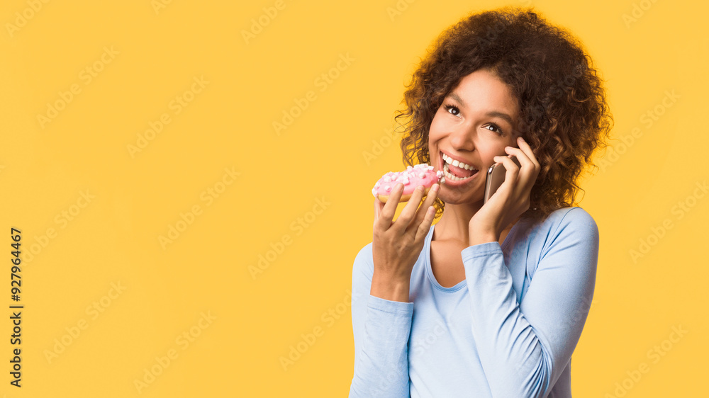Unhealthy eating. Pregnant woman eating donut and talking on phone, white background with free space, panorama Unhealthy eating. Pregnant woman eating donut and talking on phone, white background with free space, panorama