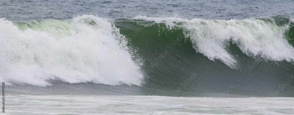 Horizontal view of a large wave breaking in the Atlantic Ocean due to Hurricane Ernesto off Shore Horizontal view of a large wave breaking in the Atlantic Ocean due to Hurricane Ernesto off Shore