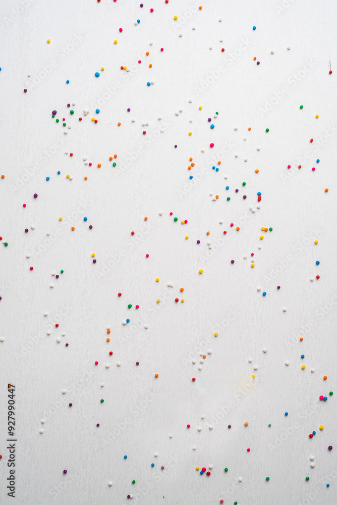 Colorful sprinkles on white background Colorful sprinkles on white background