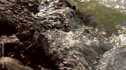 Close up of water splashing on rocks