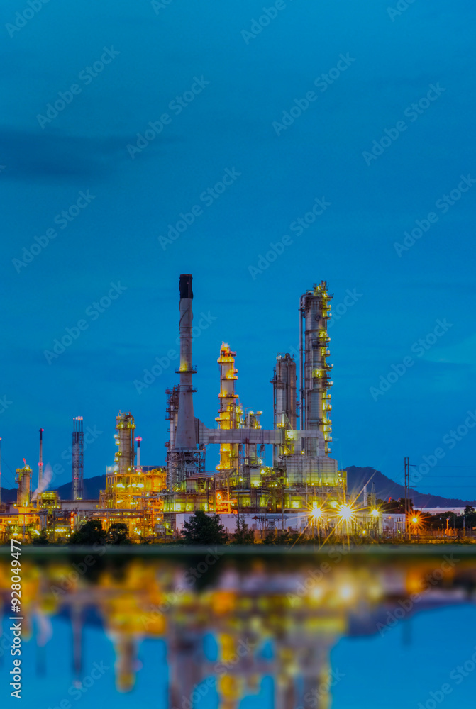 Obraz premium Vertical Oil refinery gas petrol plant industry with crude tank, gasoline supply chemical factory. Vertical horizontal Petroleum barrel fuel heavy industry oil refinery manufacturing factory plant