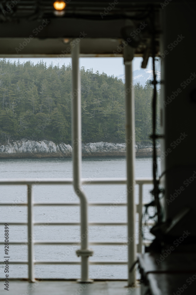 Fototapeta premium Alaska marine highway ferry along inside passage traveling from Washington to Alaska in summer 