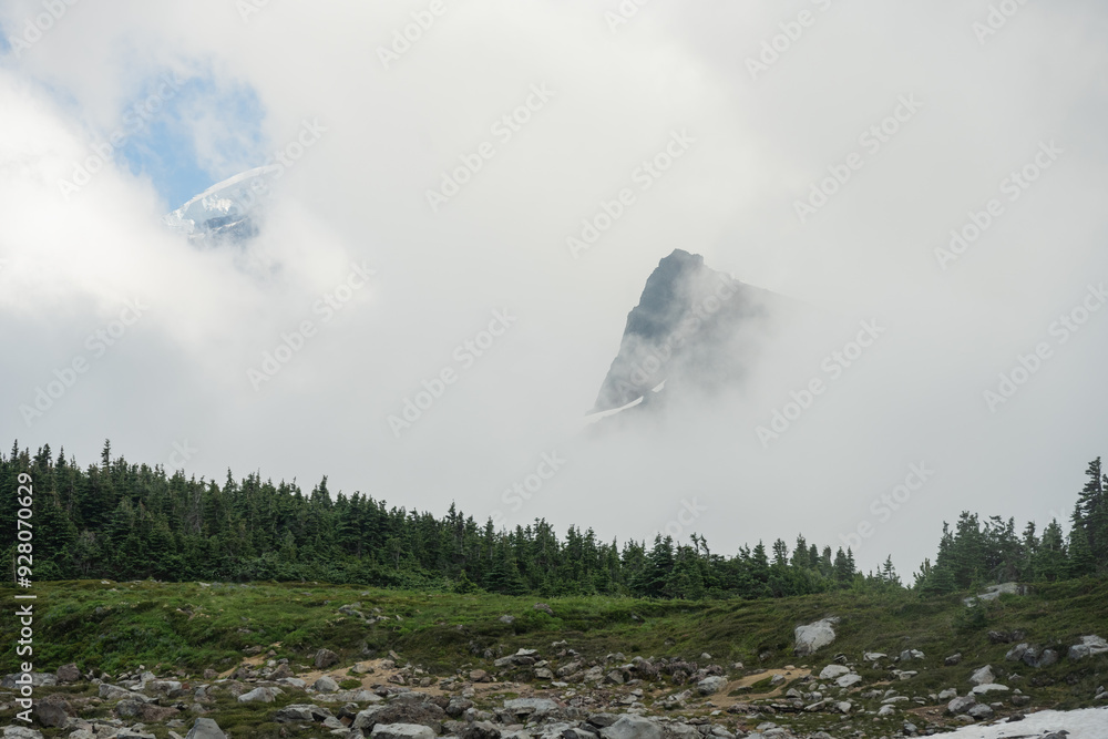 Fototapeta premium Fog Engulfs Mount Rainier and Ridges Below