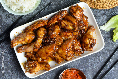 Asian style grilled chicken wings in soy-honey sauce