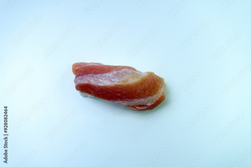 A classic Japanese dish, salmon nigiri sushi, isolated on a clean white background.