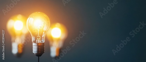 Elegant and inspiring close-up of glowing light bulbs, ideal for creativity, innovation, and warm ambiance themes.