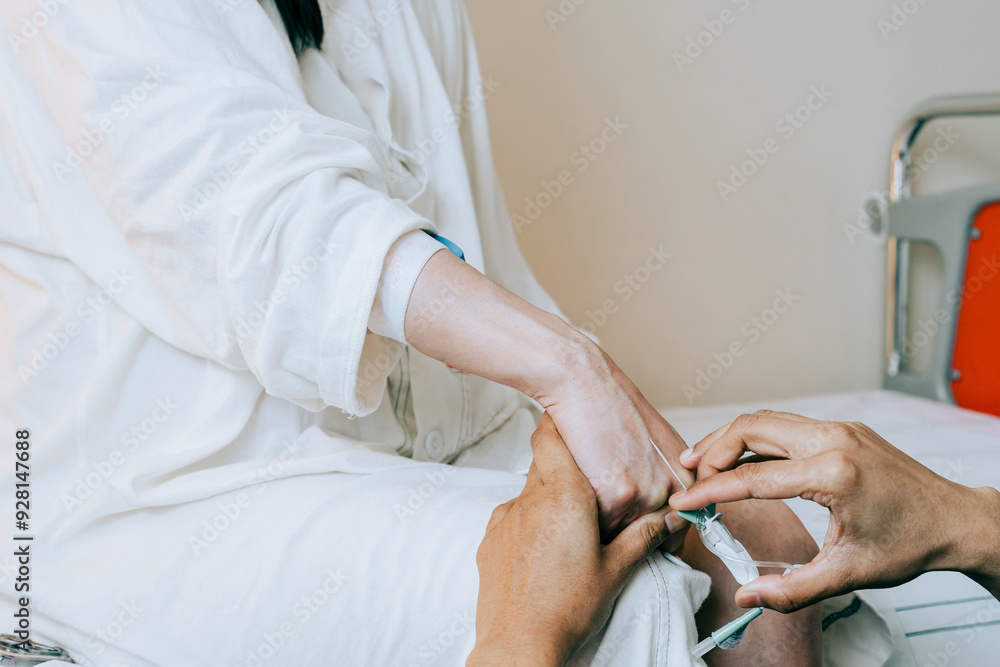 Scene of a medical worker giving an intravenous injection Scene of a medical worker giving an intravenous injection