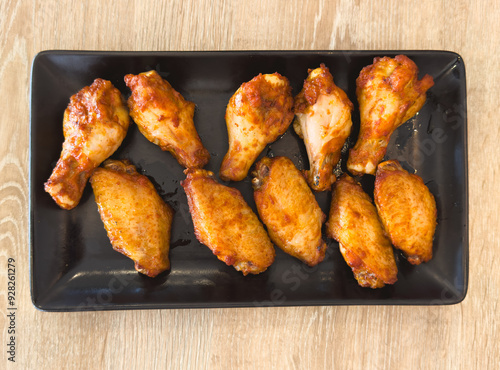 Fried chicken legs on a baking sheet